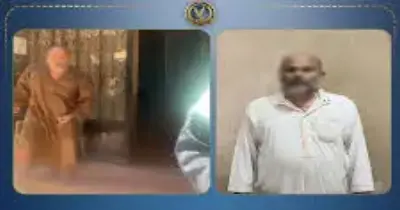 ضبط حارس عمارة يرفض دخول مالكة منزلها ويطلب السمسرة بالسب والقذف في الجيزة