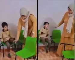معلمة تعتدي على طالب بالعصا داخل الفصل رغم توسلاته.. (فيديو)