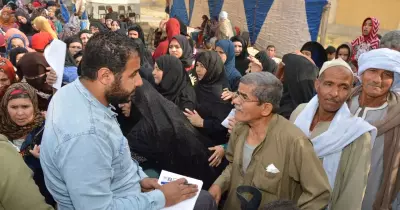 جامعة عين شمس توزع 800 بطانية على أهالي بني سويف