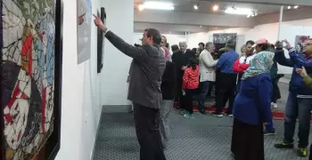 جامعة المنيا تفتتح معرض تجميل محطة أتوبيس بكلية الفنون (صور)