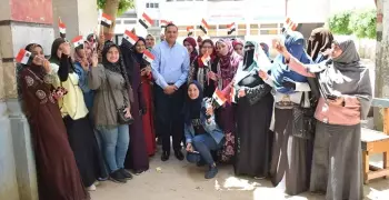 جامعة سوهاج تخصص اتوبيسات لنقل طلابها المغتربين للجان استفتاء الدستور (صور)