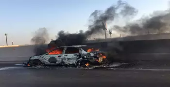 اشتعال النيران في سيارة أعلى محور 26 يوليو