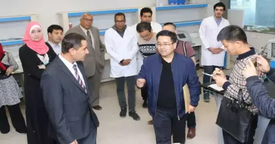 وفد صيني يزور معهد بحوث الإلكترونيات