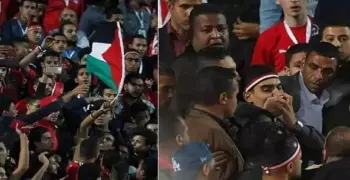 نيابة أمن الدولة العليا تحقق مع الطالب الذي رفع علم فلسطين في الاستاد