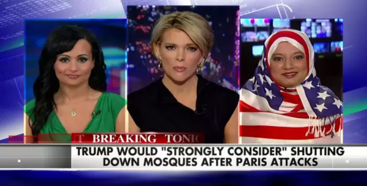  مسلمة ترتدي علم أمريكا كحجاب ردا على هدم المساجد (فيديو) 